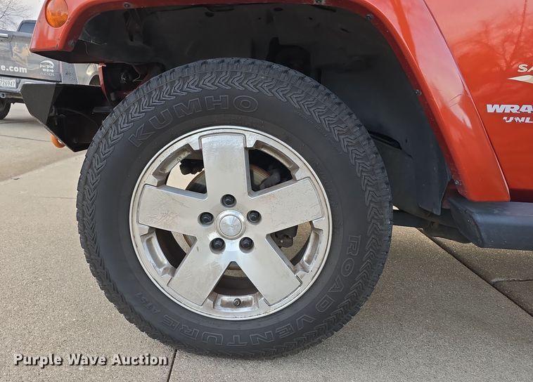 image for item DV0146 2009 Jeep Wrangler Unlimited Sahara SUV