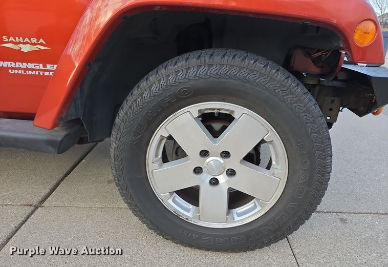 image for item DV0146 2009 Jeep Wrangler Unlimited Sahara SUV