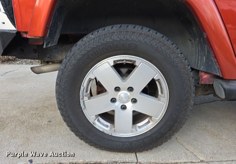 image for item DV0146 2009 Jeep Wrangler Unlimited Sahara SUV