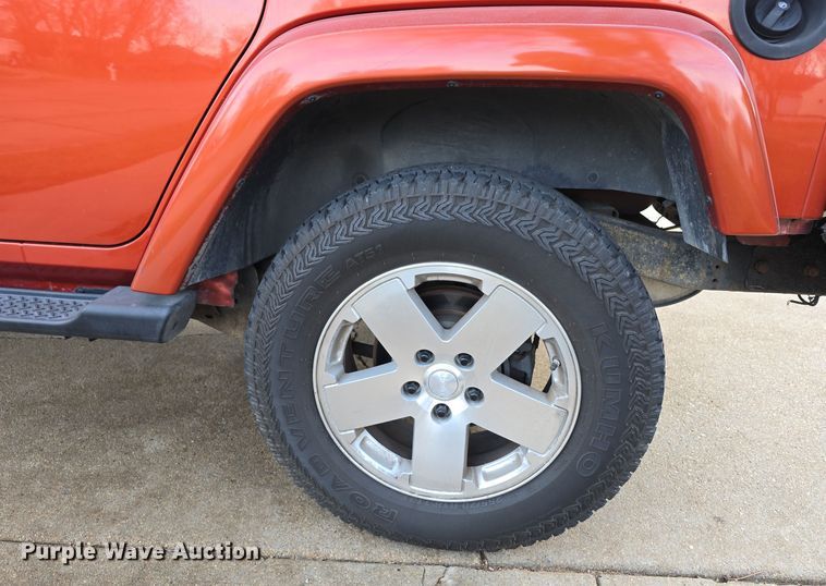 image for item DV0146 2009 Jeep Wrangler Unlimited Sahara SUV