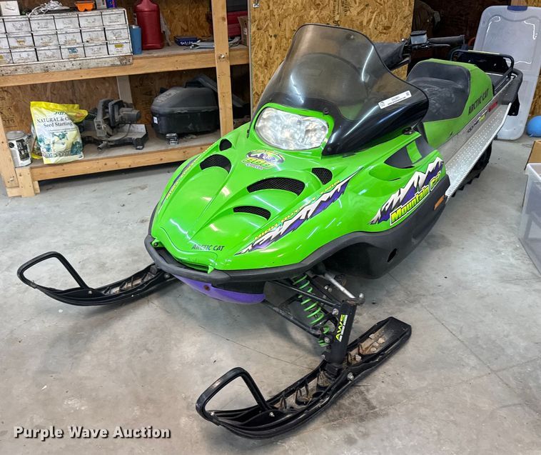 image for item DX3891 (2) Arctic Cat Mountain Cat snowmobiles