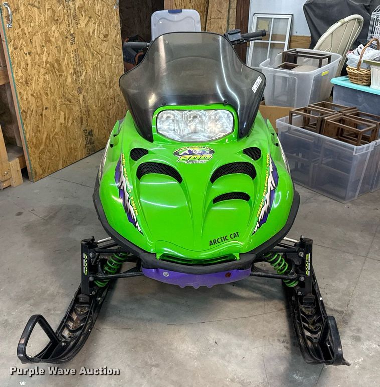 image for item DX3891 (2) Arctic Cat Mountain Cat snowmobiles