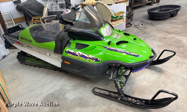image for item DX3891 (2) Arctic Cat Mountain Cat snowmobiles
