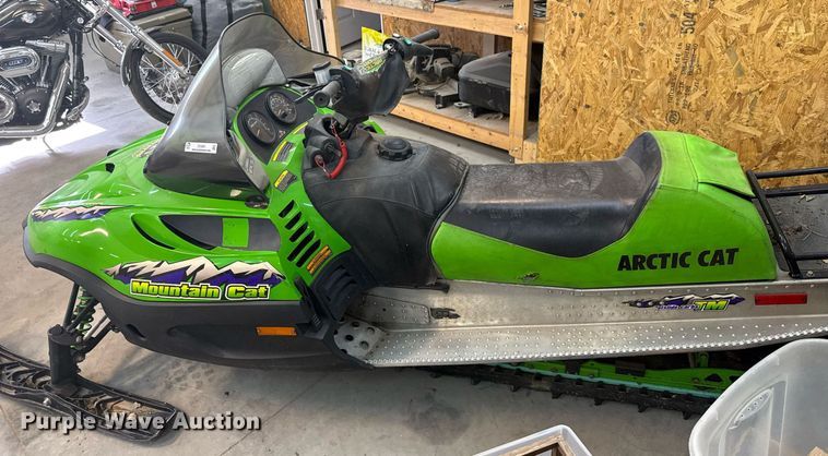 image for item DX3891 (2) Arctic Cat Mountain Cat snowmobiles