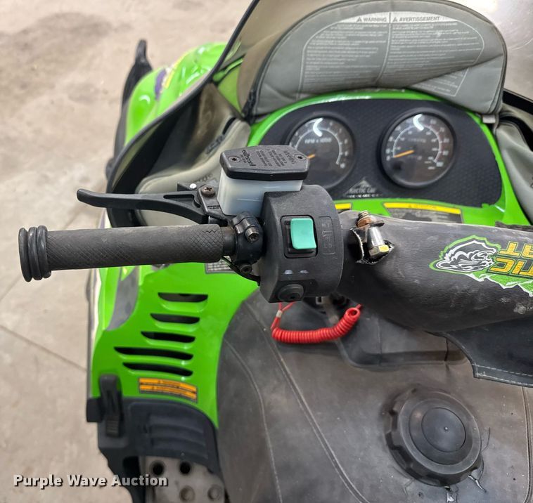 image for item DX3891 (2) Arctic Cat Mountain Cat snowmobiles