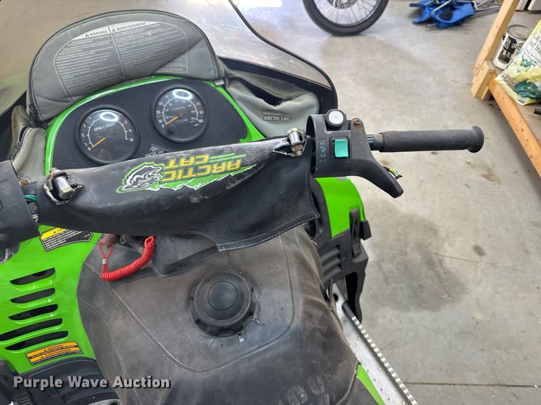 image for item DX3891 (2) Arctic Cat Mountain Cat snowmobiles