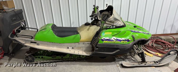 image for item DX3891 (2) Arctic Cat Mountain Cat snowmobiles