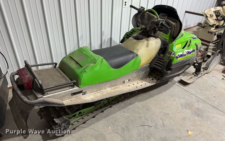 image for item DX3891 (2) Arctic Cat Mountain Cat snowmobiles