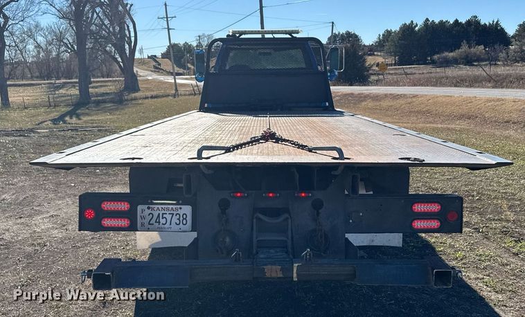 image for item DX3892 1999 GMC C6500 rollback truck