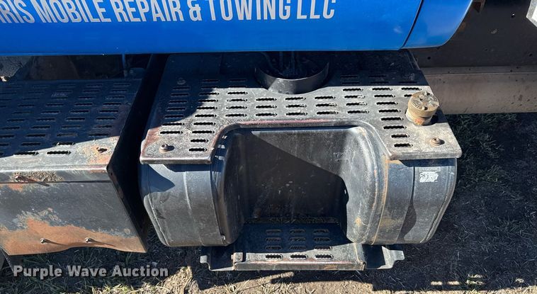 image for item DX3892 1999 GMC C6500 rollback truck