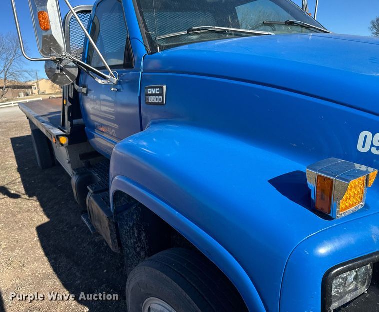 image for item DX3892 1999 GMC C6500 rollback truck