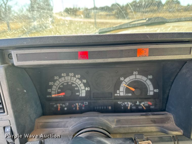 image for item DX3892 1999 GMC C6500 rollback truck