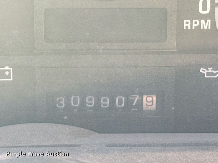 image for item DX3892 1999 GMC C6500 rollback truck