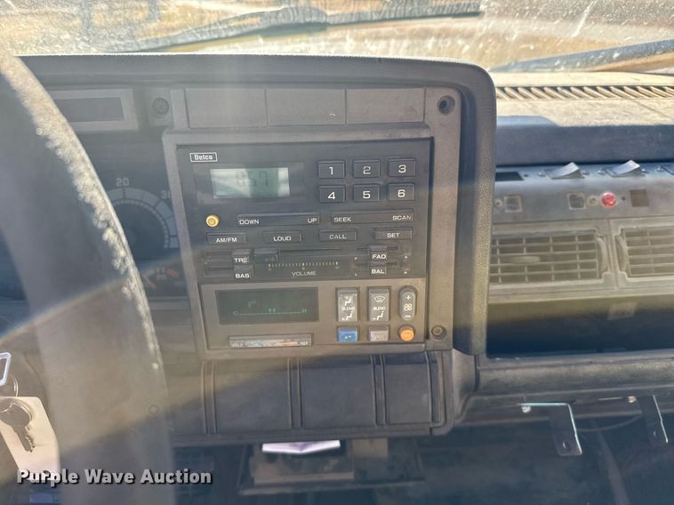 image for item DX3892 1999 GMC C6500 rollback truck