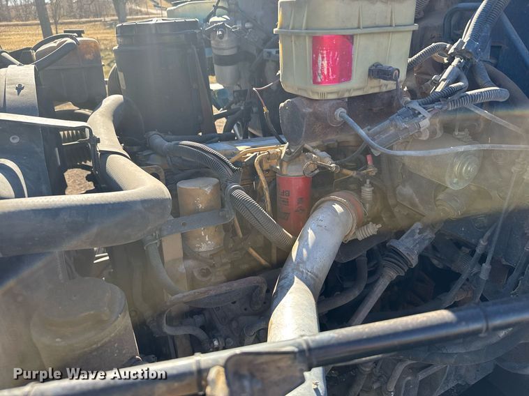 image for item DX3892 1999 GMC C6500 rollback truck