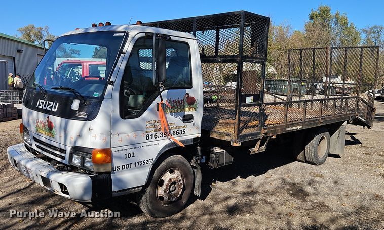 image for item EI8532 2002 Isuzu  NPR flatbed truck