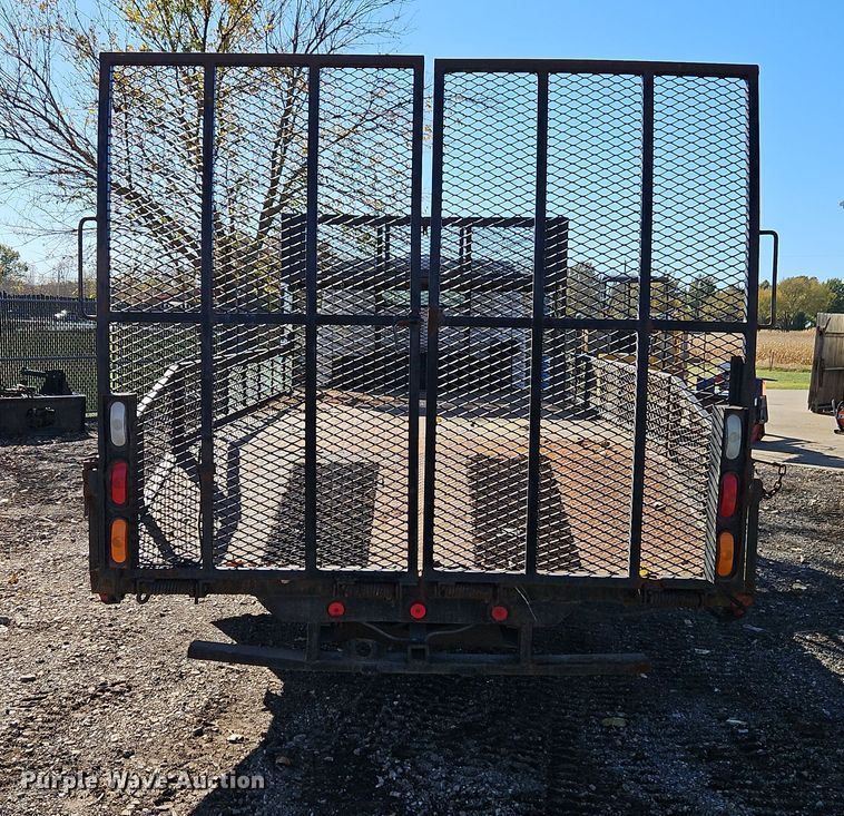 image for item EI8532 2002 Isuzu  NPR flatbed truck