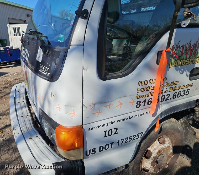 image for item EI8532 2002 Isuzu  NPR flatbed truck