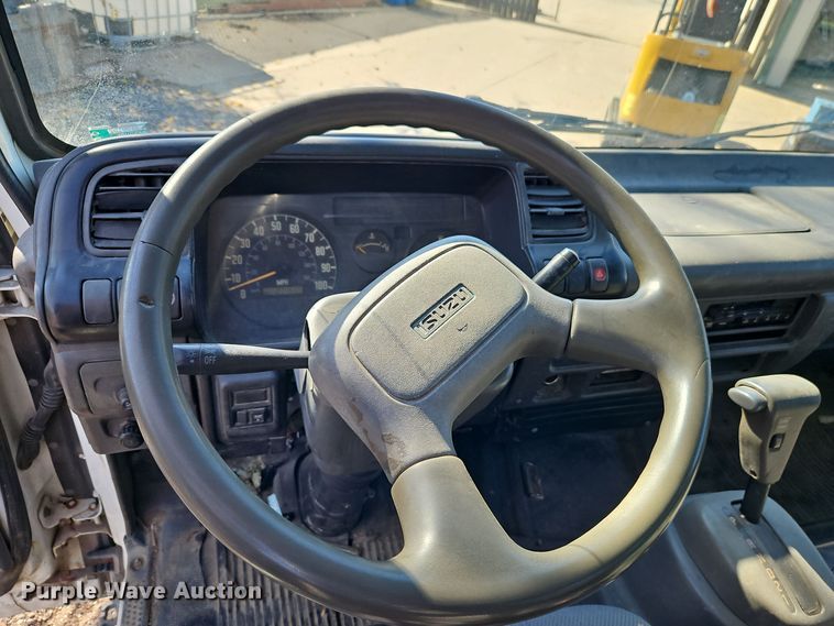 image for item EI8532 2002 Isuzu  NPR flatbed truck