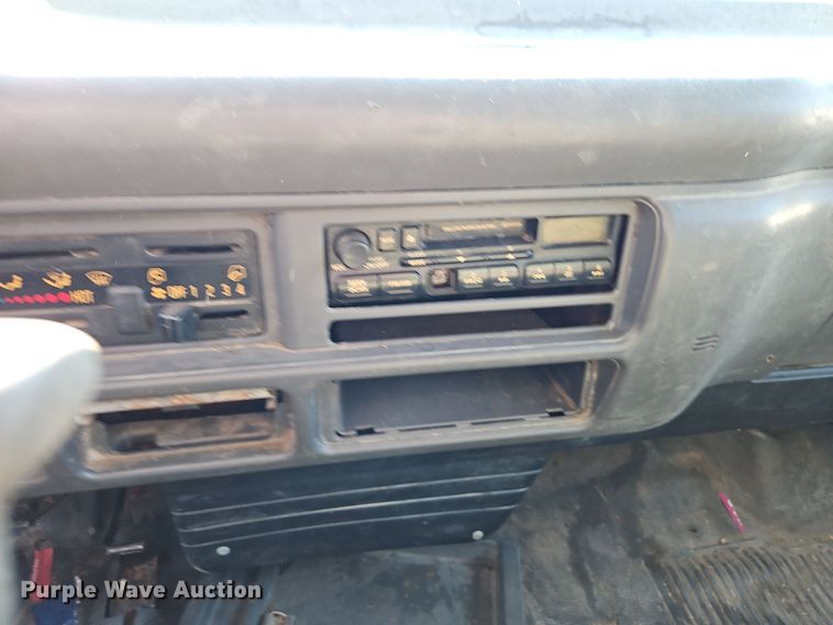 image for item EI8532 2002 Isuzu  NPR flatbed truck