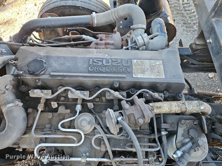 image for item EI8532 2002 Isuzu  NPR flatbed truck