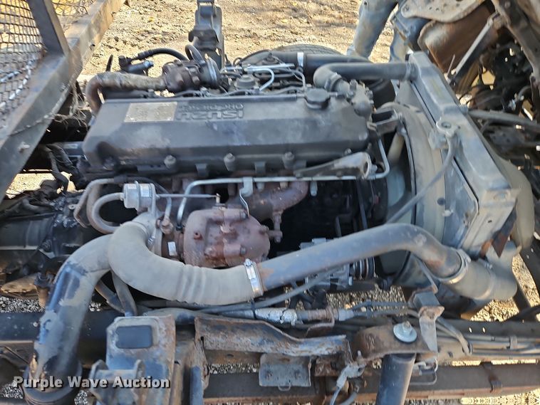 image for item EI8532 2002 Isuzu  NPR flatbed truck