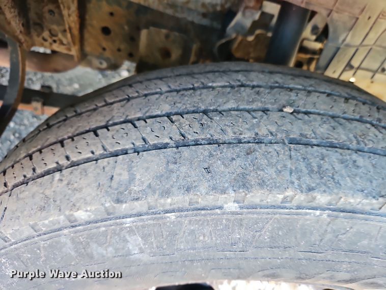 image for item EI8532 2002 Isuzu  NPR flatbed truck