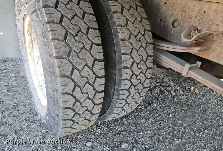 image for item EI8532 2002 Isuzu  NPR flatbed truck