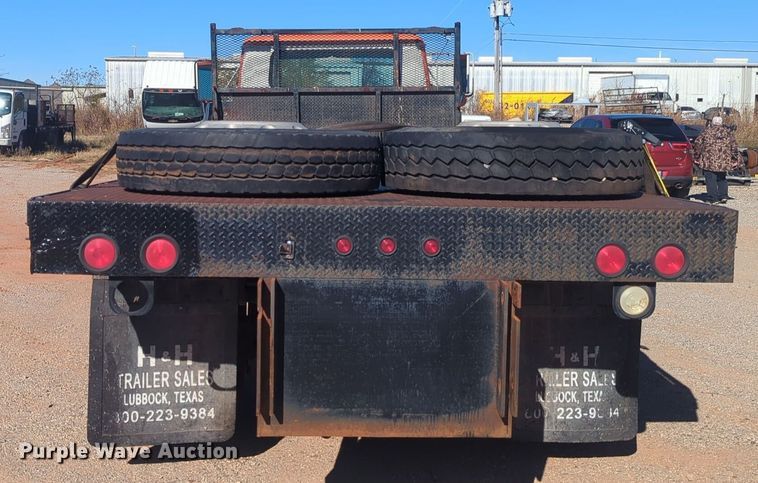 image for item ER4555 2000 International 4700 flatbed truck
