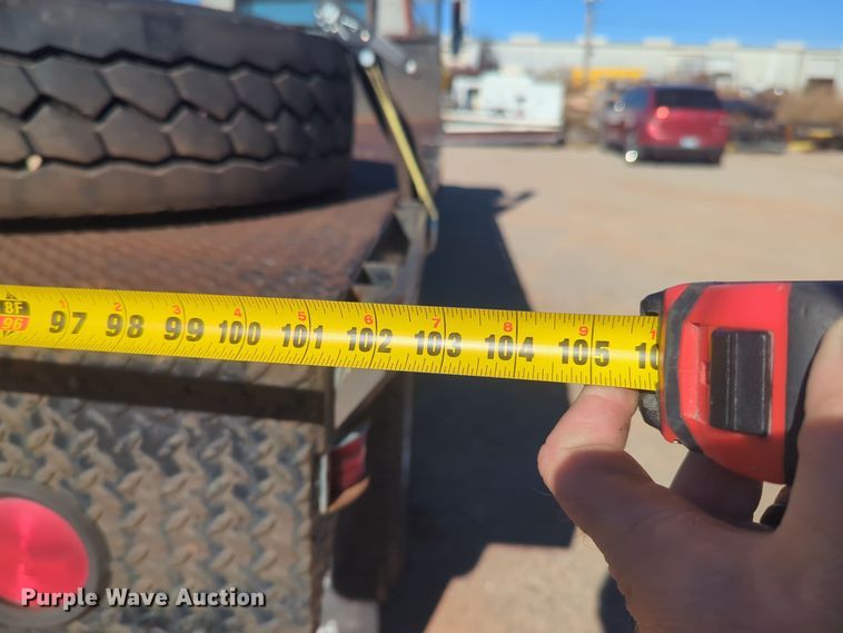 image for item ER4555 2000 International 4700 flatbed truck