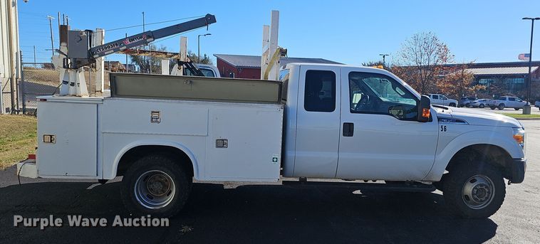 image for item OJ9148 2015 Ford F350 Super Duty XLT SuperCab utility bed pickup truck