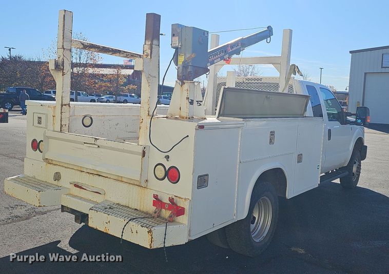 image for item OJ9148 2015 Ford F350 Super Duty XLT SuperCab utility bed pickup truck