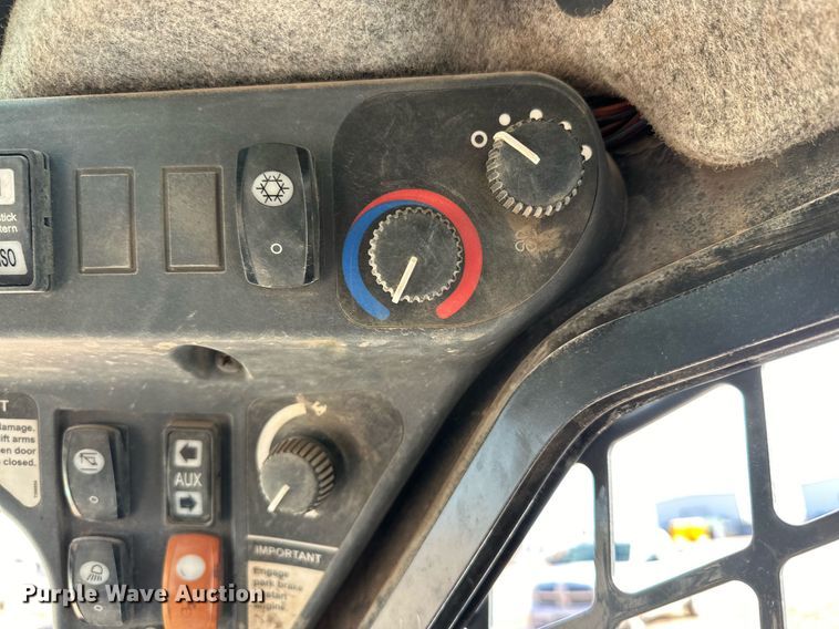 image for item DP6020 2012 John Deere 333D tracked skid steer loader