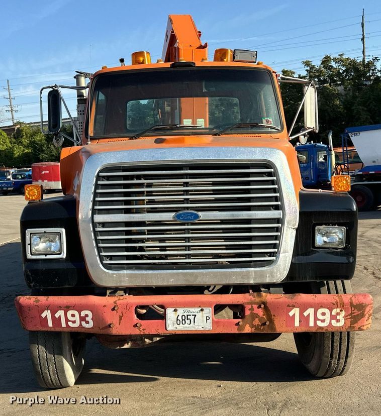 image for item DT2031 1997 Ford  LNT8000 flatbed truck with crane