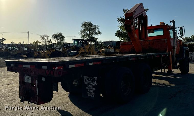 image for item DT2031 1997 Ford  LNT8000 flatbed truck with crane