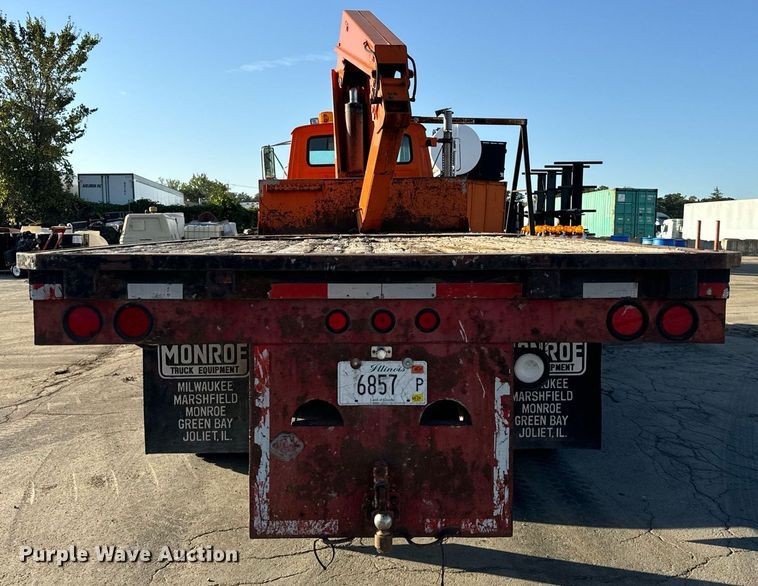 image for item DT2031 1997 Ford  LNT8000 flatbed truck with crane