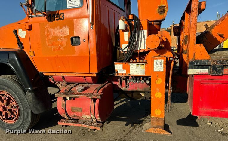 image for item DT2031 1997 Ford  LNT8000 flatbed truck with crane