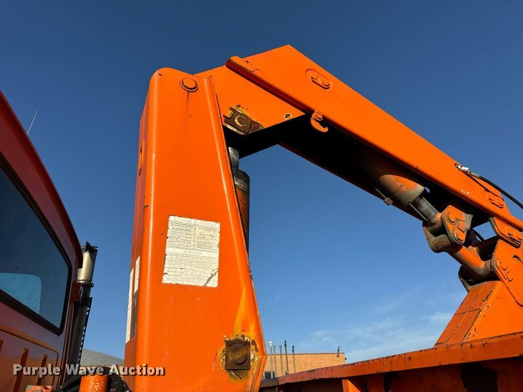 image for item DT2031 1997 Ford  LNT8000 flatbed truck with crane