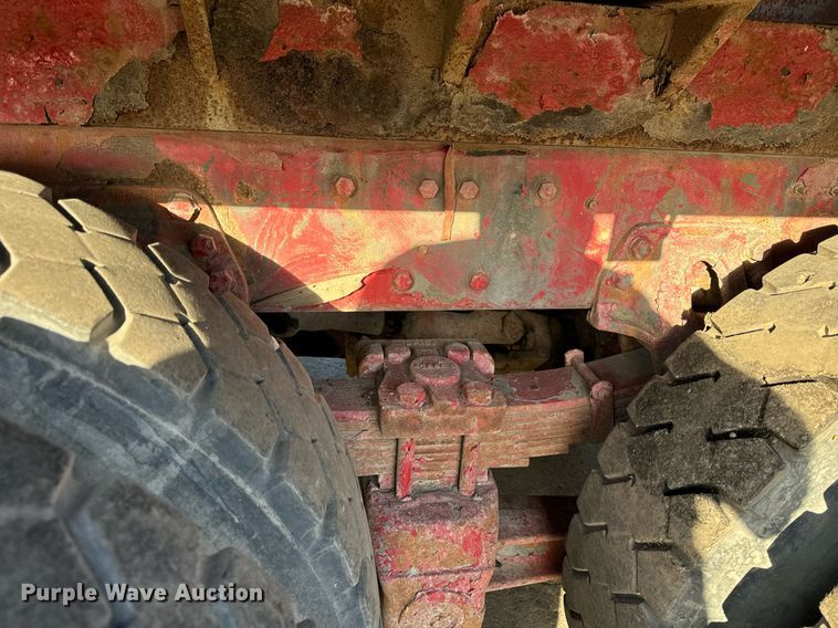 image for item DT2031 1997 Ford  LNT8000 flatbed truck with crane