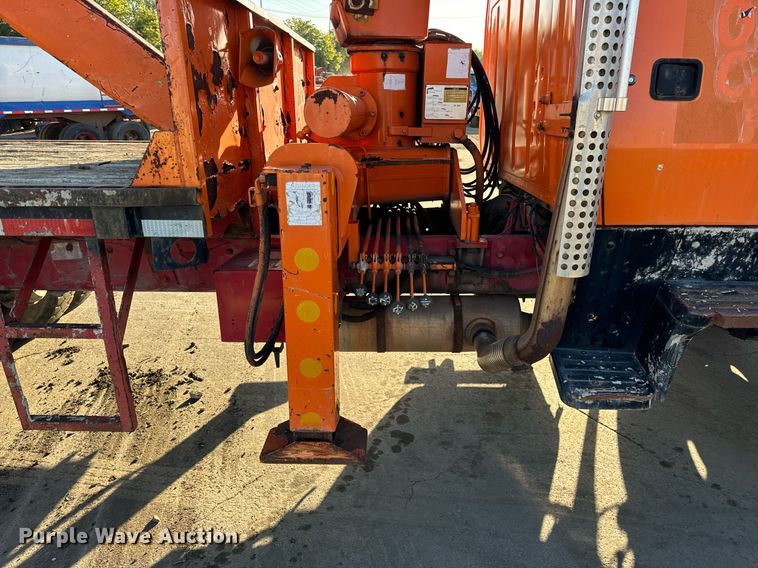 image for item DT2031 1997 Ford  LNT8000 flatbed truck with crane