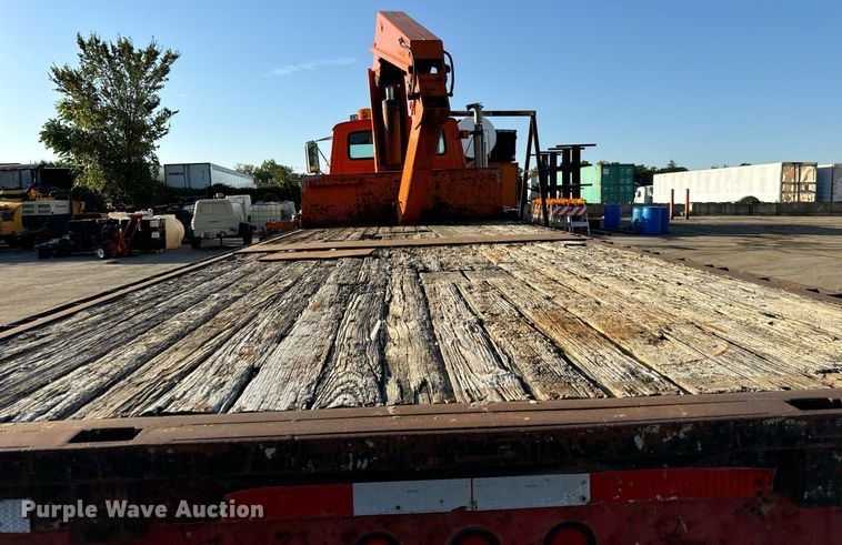 image for item DT2031 1997 Ford  LNT8000 flatbed truck with crane