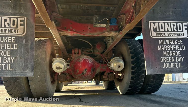 image for item DT2031 1997 Ford  LNT8000 flatbed truck with crane