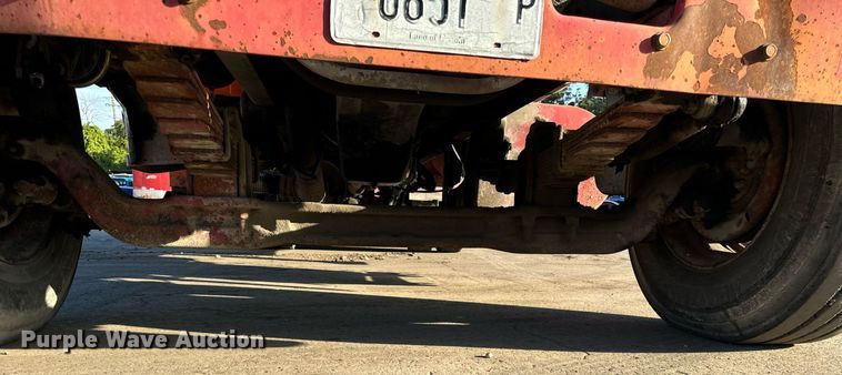 image for item DT2031 1997 Ford  LNT8000 flatbed truck with crane