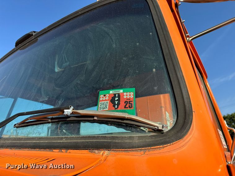 image for item DT2031 1997 Ford  LNT8000 flatbed truck with crane