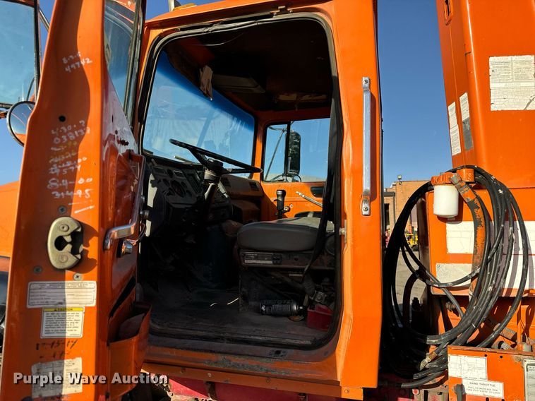 image for item DT2031 1997 Ford  LNT8000 flatbed truck with crane