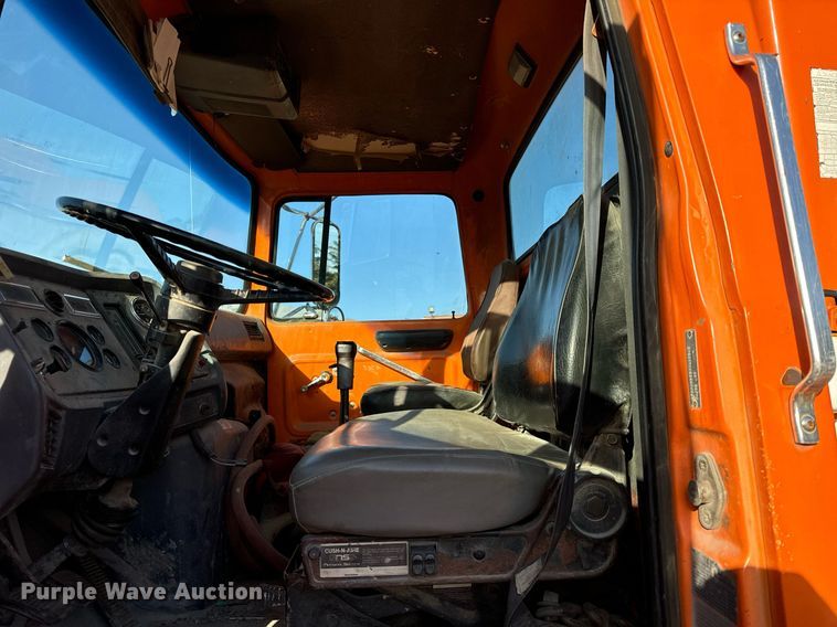 image for item DT2031 1997 Ford  LNT8000 flatbed truck with crane