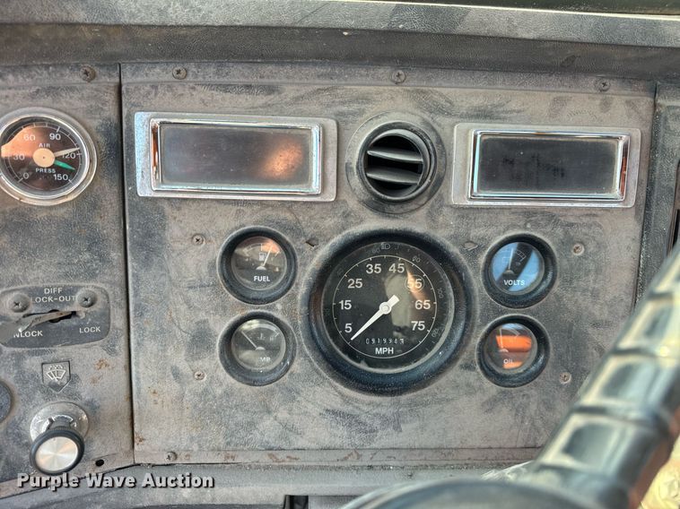 image for item DT2031 1997 Ford  LNT8000 flatbed truck with crane