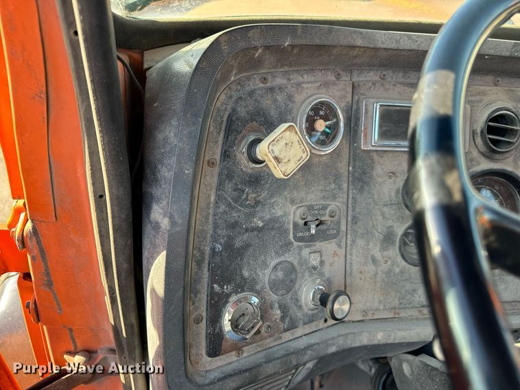 image for item DT2031 1997 Ford  LNT8000 flatbed truck with crane