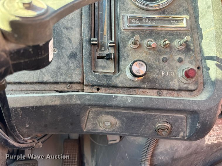 image for item DT2031 1997 Ford  LNT8000 flatbed truck with crane