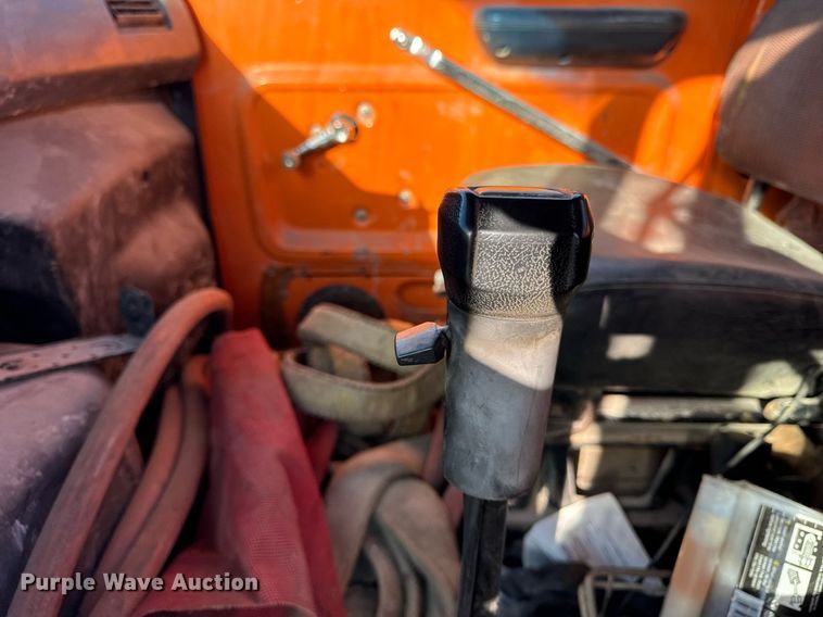 image for item DT2031 1997 Ford  LNT8000 flatbed truck with crane